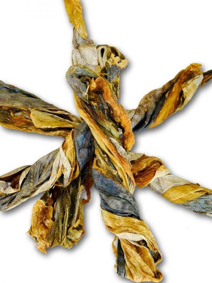 Drool Pet Co. Photograph of 4 Mackerel Skin Twists. Dried twisted Mackerel skins on top of each other