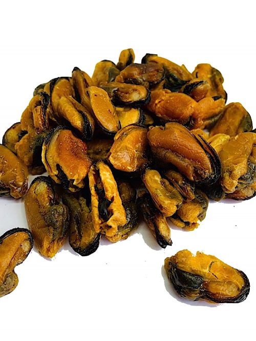 a photograph of dog treat dried Green lip Mussels on a white background