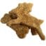 Photograph of a biscuit shaped like a dog bone and a biscuit shaped like a deer on top on each other on a white background
