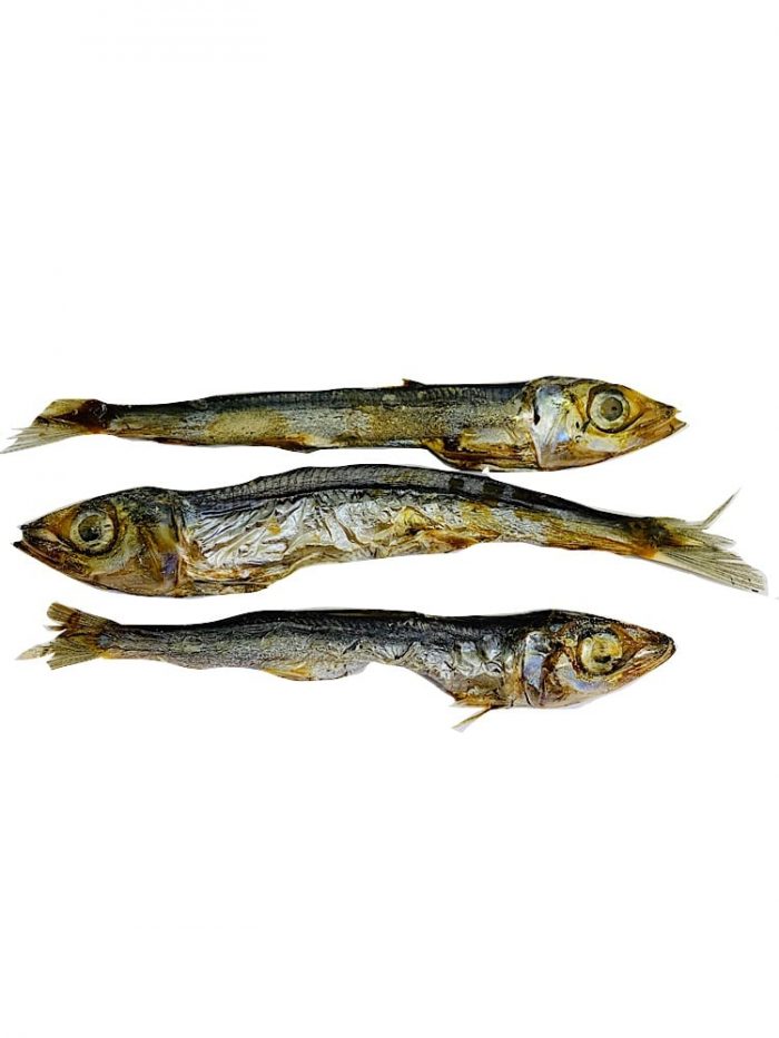 Drool pet Co. dried pilchards. Photograph of three dried pilchard fish dog and cat treats on a white background.