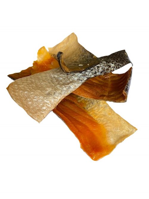 Photograph of a Drool Pet Co. dried salmon strips on a white background.