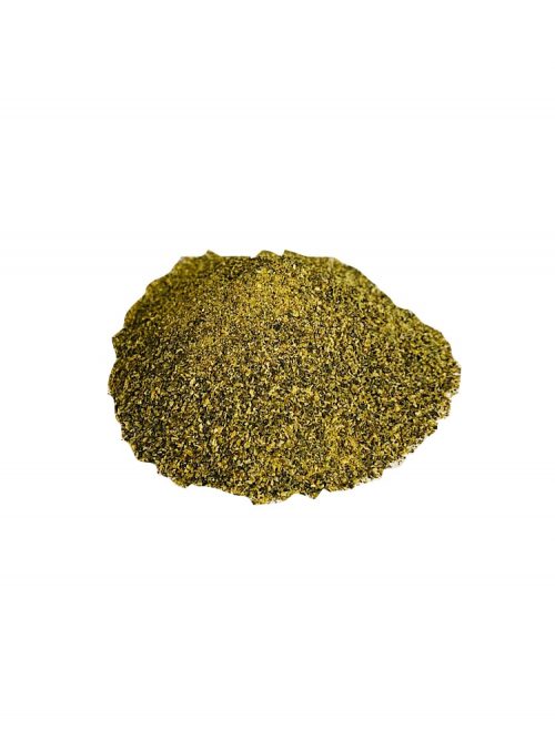 Drool pet Co. Seaweed meal Topper Photograph of a pile of seaweed meal on a white background.