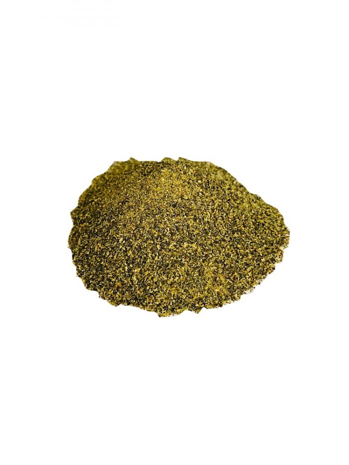 Drool pet Co. Seaweed meal Topper Photograph of a pile of seaweed meal on a white background.